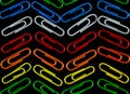 Color clips on a black background. Seamless pattern