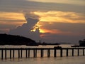 Sunrise, sunset,orrange clouds, sky, pier, sea, moorage, ship.