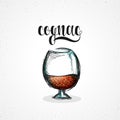 Color cognac in glass with calligraphy. Sketch by hand