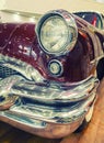 Color detail on the headlight of vintage american car. Royalty Free Stock Photo