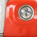 Color detail on the headlight of a vintage car Royalty Free Stock Photo