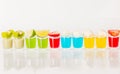 Color drinks in shot glass, blue, green, red, yellow and creamy Royalty Free Stock Photo