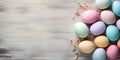 Color easter eggs on a wood background - Celebration design