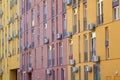 Color facade of a house with lot of air condition units. Royalty Free Stock Photo