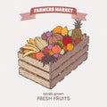 Color farmers market label with fruits in wooden crate.