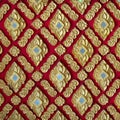 The color golden stucco on red and Thai art wall pattern Royalty Free Stock Photo