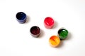 Color gouache jars on white background