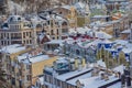 Color houses in the classic style covered with snow