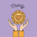 Color image background hands with floating golden coin with heart shape inside charity symbol