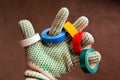 Color insulation tapes on fingers of hand in protective glove Royalty Free Stock Photo