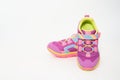 Color kid sneakers shoes on floor front view soft focus