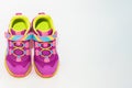 Color kid sneakers shoes on floor top view soft focus copy space