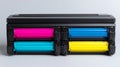 Color Laser Printer Toner Cartridges in Magenta, Cyan, Blue, and Yellow Royalty Free Stock Photo