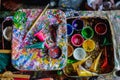 The color liner tray and color storage box are placed on the artist`s desk to prepare and facilitate the use of color to create be