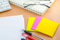 Color note paper with pen on computer desk Royalty Free Stock Photo