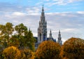 Town hall of Vienna, Austria on an autumn afternoon with colorful trees and dense foliage Royalty Free Stock Photo