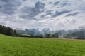 Idyllic rolling hill landscape panorama with wafts of mist