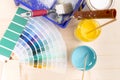 Color palette guide and painting supplies, paint brushes and col Royalty Free Stock Photo