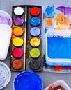 Color Palette with Painting Arts Craft brush on Table Top view