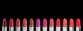 Color palette. Set of lipsticks isolated on black background Royalty Free Stock Photo