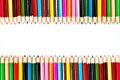 Color palette wooden crayon pencils at white background