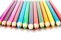 Color palette wooden crayon pencils at white background Royalty Free Stock Photo