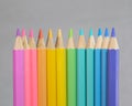 Color pancils, Group of pastel color pencil laying in row striaght line made by pencil tips with grey background close up, Pastel Royalty Free Stock Photo