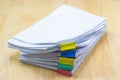 Color paper clip with Stack of papers documents Royalty Free Stock Photo