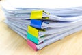 Color paper clip with Stack of papers documents Royalty Free Stock Photo