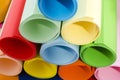 Color paper rolled and piled. Royalty Free Stock Photo