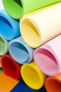 Color paper rolled and piled. Royalty Free Stock Photo