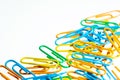Color paperclip white background isolated Royalty Free Stock Photo
