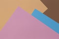 Color papers geometry composition background with beige, brown pink and light blue tones Royalty Free Stock Photo