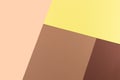 Color papers geometry composition background with yellow pink, beige and brown tones. Royalty Free Stock Photo