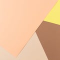 Color papers geometry composition background with yellow pink, beige and brown tones. Royalty Free Stock Photo