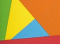 Color papers geometry flat composition background with yellow, green, orange, red and blue tones Royalty Free Stock Photo