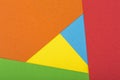 Color papers geometry flat composition background with yellow, green, orange, red and blue tones Royalty Free Stock Photo