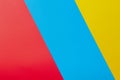 Color papers geometry flat composition background with yellow red and blue tones Royalty Free Stock Photo