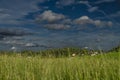 Color pasture lands and meadows in north Austria with dark stormy sky