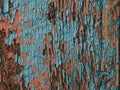 Color-Peel wood texture. Old wooden painted light blue rustic fence, paint peeling background Royalty Free Stock Photo