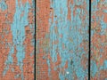 Color-Peel wood texture. Old wooden painted light blue rustic fence, paint peeling background Royalty Free Stock Photo