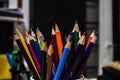 Color pencils in artist room black background