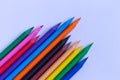 Color pencils on a blue background close-up. Diagonal.space for text Royalty Free Stock Photo