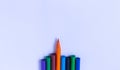 Color pencils on a blue background. Pencil tips below, top view.copyspace for text Royalty Free Stock Photo