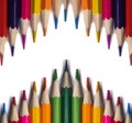 Isolated colored pencils located diagonally on a white background