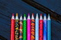 Color pencils close-up on a wooden table. Pencils to school. Bright design solutions