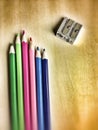 Color pencils and double sharpner Royalty Free Stock Photo