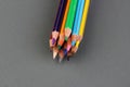 Color pencils  on grey background. Royalty Free Stock Photo