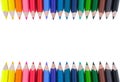 Color pencils isolated on white background. Soft trendy pastel colors, close up. Colored crayons.