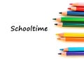Color pencils isolated on white background. Text schooltime. Royalty Free Stock Photo